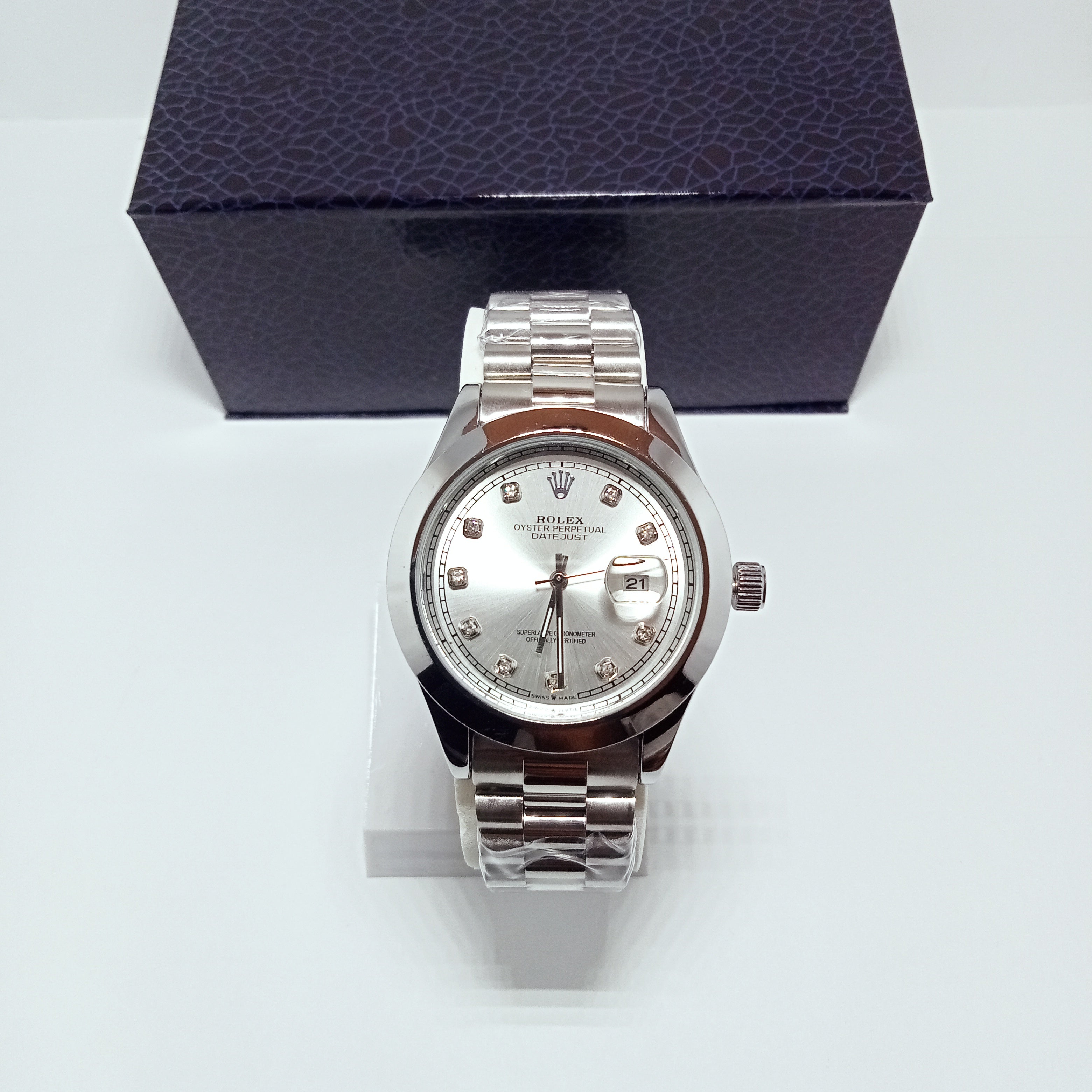 Rolex Date just White Dial watch.
