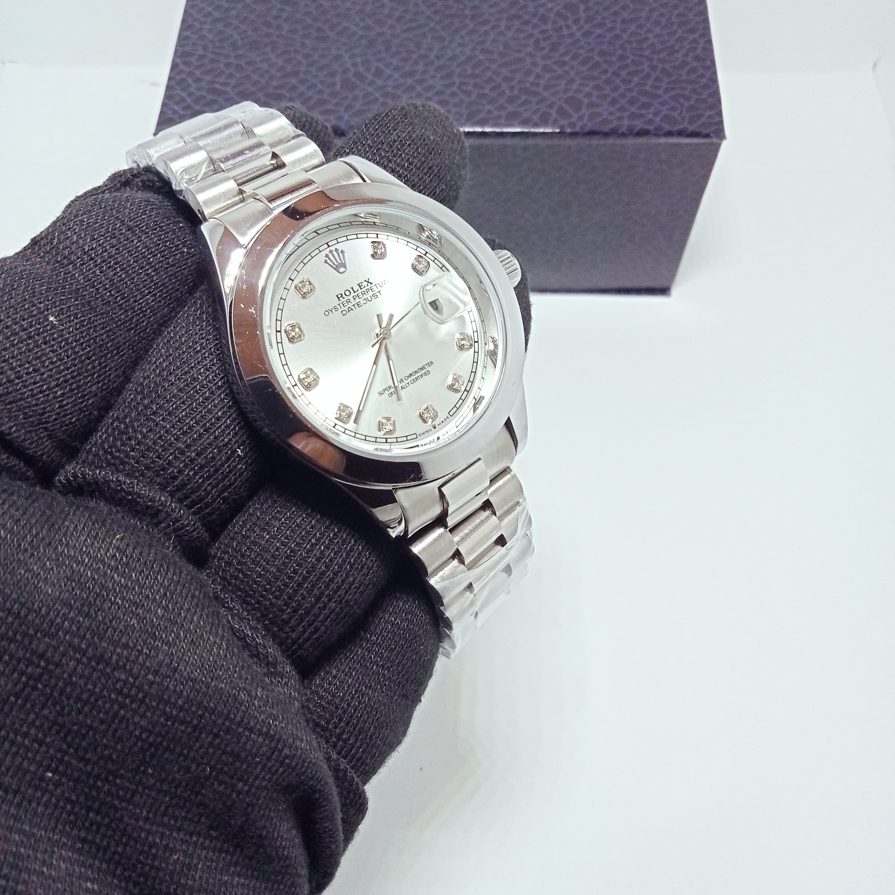 Rolex Date just White Dial watch.